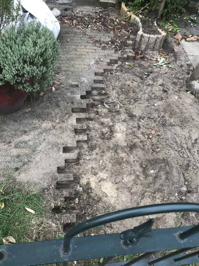 Removing the first bits of paving and planters